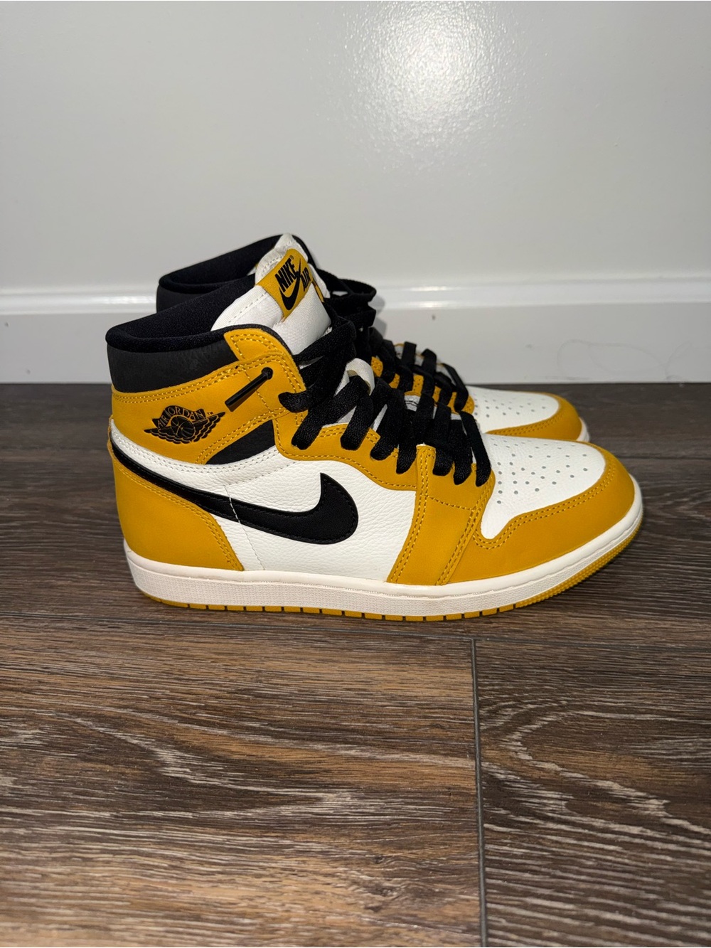 Nike Air Jordan’s Yellow Black White High-Top Sneakers